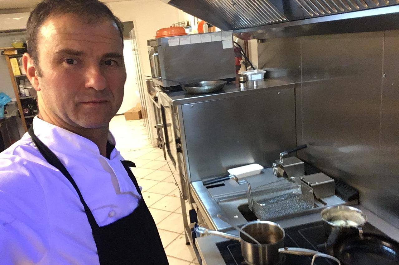 Private chef Vjeko in the kitchen, preparing dinner for Villa Babudri guests